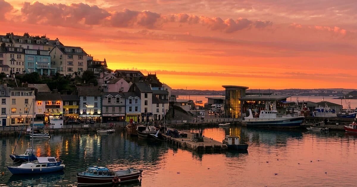 Sunset over Brixham harbour and waterfront