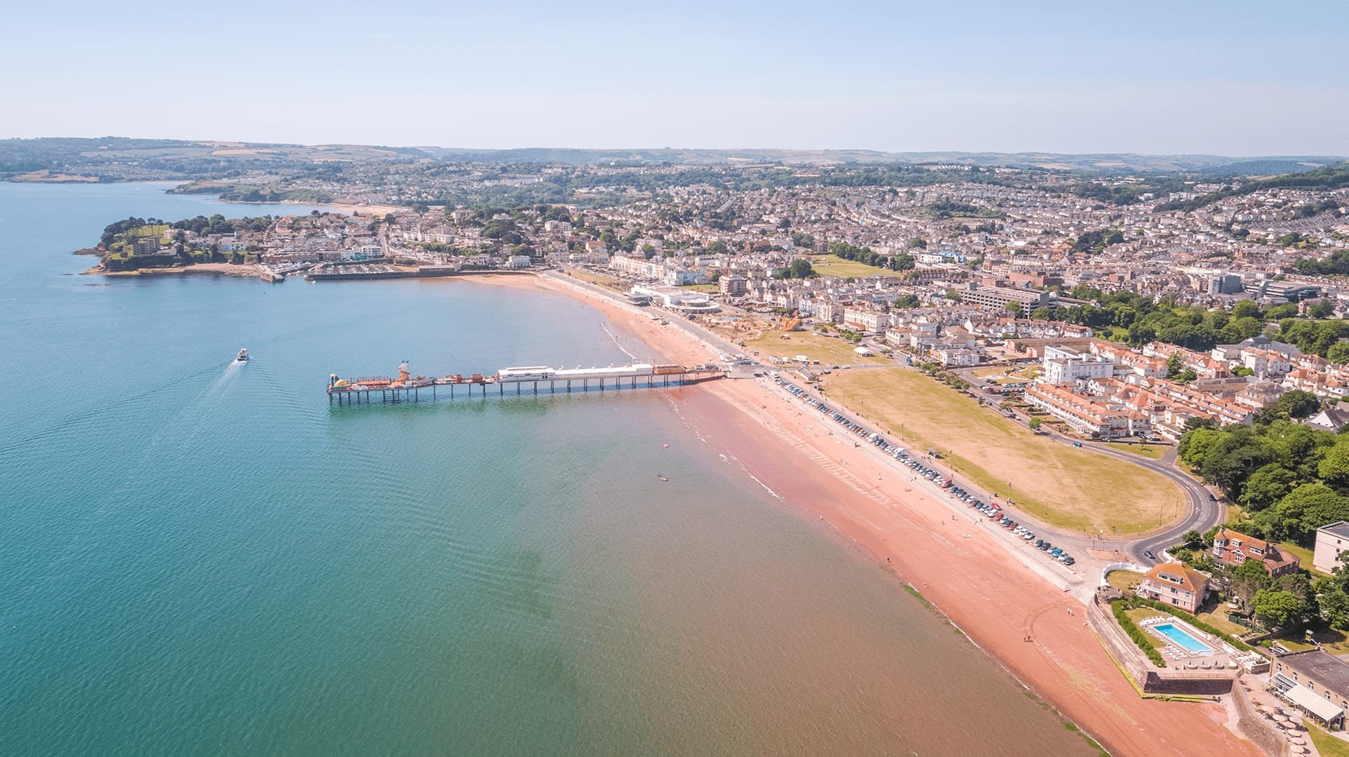Aerial view of Paignton Pier, beach and seafront