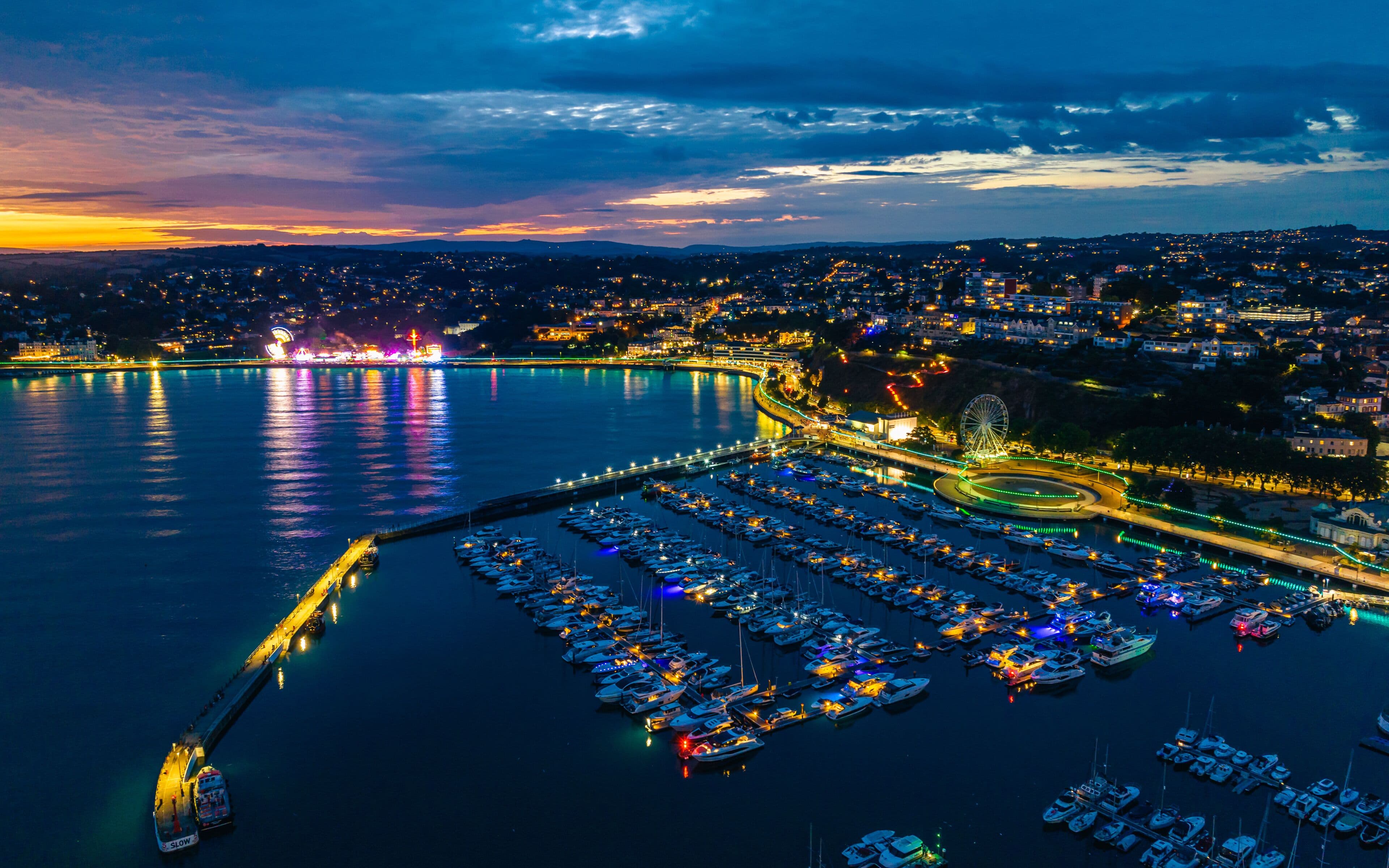 Twilight aerial view of Torquay marina and the English Riviera